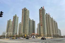 In just 30 years, China‘s state-controlled economy became the world’s second largest, strictly managed by government policies and decrees. One of the few economic sectors where the rising and affluent middle class could invest was real estate and construction. As much as 30% of China’s economy is housing-related. Families have tied their savings into apartments. No one is renting them. In Shanghai, buying an apartment costs 45 times the annual income of a typical Shanghai worker. But that may have created the largest housing bubble in human history. It’s easy to understand why everybody talks of a bubble when you go to China and check it out. Or you may watch the new report from CBS “60 Minutes” titled “China’s real estate bubble.” The most populated nation on earth is building houses, districts and cities with no one in them. The world’s economy will suffer a great blow if the Chinese economy seizes up. Source: Business Insider – “This ’60 Minutes’ Video Of China’s Ghost Cities Is More Surreal Than Anything We’ve Ever Seen” Related Articles China’s real estate bubble – 60 Minutes (macromon.wordpress.com) China’s Housing Bubble Goes Mainstream America (zerohedge.com) Re: China’s Real Estate Bubble…about to burst? (libertycaucus.net) China to flatten 700 mountains to build a city (chinadailymail.com)