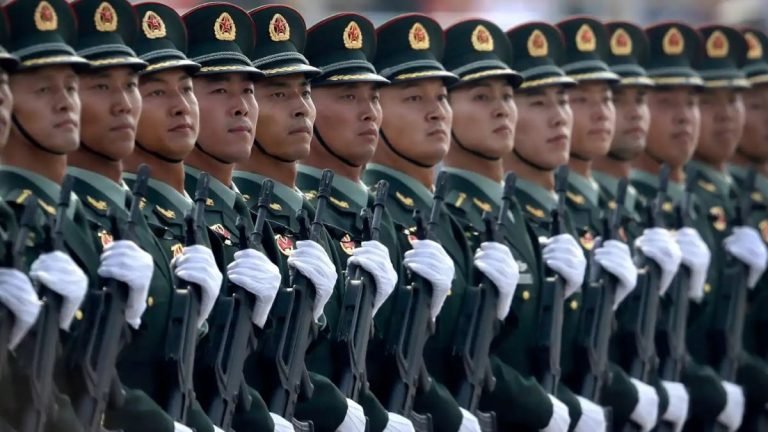 The Chinese Communist Party has unintentionally revealed weaknesses of the country’s military. One indication came with the building of facilities for launching new intercontinental ballistic missiles in an inland desert region. The other was a series of further attempts to increase childbirths, including measures to help reduce the costly burden of educating children. Behind these moves lurks evidence that the country is addressing concerns regarding troop morale and the military’s ability to fight a sustained war. For nearly a decade, China has been busy in the South China Sea, first building artificial islands, then deploying radar equipment and missiles to deter foreign military aircraft and vessels from approaching the area, and finally deploying strategic nuclear submarines capable of launching ballistic missiles in the now-protected sea. Submarine-launched ballistic missiles, known as SLBMs, are the ultimate weapon. They allow nations to avoid being put in disadvantageous positions since the subs that carry them can remain in deep waters, keeping the enemy at bay, until the very end. So why is China rushing to build new ICBM bases in inland desert areas? Experts believe the reason lies in the fact that although China has militarized some waters in the South China Sea and deployed SLBMs, it no longer has confidence it can defend the area should conflict arise. In January 2018, a Chinese submarine humiliatingly revealed its lack of high-level performance. The submarine, traveling undersea in a contiguous zone of Japan’s Senkaku Islands, in the East China Sea, was quickly detected by the Japanese Self-Defense Forces. It was quick to surface and unhesitatingly raise the Chinese flag, which might as well have been a white flag of surrender; the crew presumably feared their vessel could be attacked with depth charges. Under international law, the Maritime Self-Defense Force could have regarded the vessel as an “unidentified submarine” that had intruded into Japanese territorial waters while submerged. Many Japanese and U.S. officials believe the incident symbolizes the low morale of Chinese troops. A Chinese submarine raises what might as well be a flag of surrender after being forced to surface near Japan’s Senkaku Islands in January 2018. (Photo provided by the Ministry of Defense) Chinese Communist Party governments have spent the past quarter-century increasing military spending and staging military parades and naval reviews. But visible might like missiles and tanks is only one component of military power. There are also invisible inputs, like troop morale. The Chinese navy has been working on an aircraft carrier program, but a former Japanese Ministry of Defense official predicts Chinese aircraft carriers will not leave their military ports in conflicts out of fear they might be attacked and sunk. Some believe that Chinese soldiers’ low morale is attributable to the country’s long-standing one-child policy, which has made the military one of the world’s leading “one-child armies.” “Over 70% of Chinese soldiers are ‘only children,’ and the rest are the second or later children whose parents had to pay fines to bear them,” said Kinichi Nishimura, a former Ground Self-Defense Force officer who for many years has analyzed East Asia’s military balance at the Ministry of Defense’s Defense Intelligence Headquarters and elsewhere. The Confucianist view that children must respect and take good care of their parents and ancestors remains deep-rooted in China. As a result, parents are particularly reluctant to see their children die earlier than they do. Parents of one-child households must feel even more strongly about their only son or daughter becoming nothing more than a proverbial “nail.” In China, where people tend to have little respect for soldiers, there is a saying: “Good steel does not become nails,” meaning respectable individuals do not become soldiers. In order to ensure it can secure sufficient numbers of troops, the party has been working to improve salaries and pensions. On Aug. 1, the government enacted a law to protect the status, rights and interests of military personnel. This desperate effort to improve the patina of a military career might be a sign that the People’s Liberation Army has not been able to turn around its recruitment efforts, especially in the face of the country’s ebbing fertility rate. “The Chinese military has increased the deployment of battleships and fighter planes since a few years ago,” Nishimura said, “but their operating rates are not exactly high. It seems they are unable to sufficiently train enough soldiers to properly maintain and repair” the high-tech hardware. This is partly why the Chinese military in recent years has come to rely more on unmanned aircraft and ballistic missiles. The number of ballistic missiles China deploys has increased to several thousand. One of the PLA’s military doctrines not widely known, says, “In the initial battle of war, launch a large number of missiles and then immediately leave the front line.” This strategy was picked up from the former Soviet Union, whose military played the role of teacher while China was forming the PLA. Over the past few years, the PLA has rushed to add more fighter jets, surface ships and submarines, which might indicate an intention to increase the number of missiles that can be launched when battles commence. Unmanned aircraft are thought to have the same purpose. This strategy will continue, especially when the military is not able to secure enough soldiers. To protect themselves from Chinese missile attacks, Japan and other nations must start thinking about enhancing measures to mitigate damage. These measures include developing and deploying next-generation arms, including high-energy laser weapons and rail guns, which use electromagnetic force to launch projectiles at extremely high speeds. Japan already has a technological foundation to develop these weapons, though this capacity is not widely known in the country. Source: Nikkei